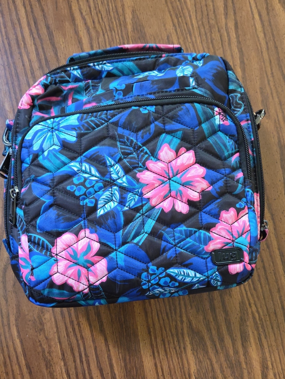 Lug Ranger 2 crossbody bag and wallet in the Resort Black floral pattern.